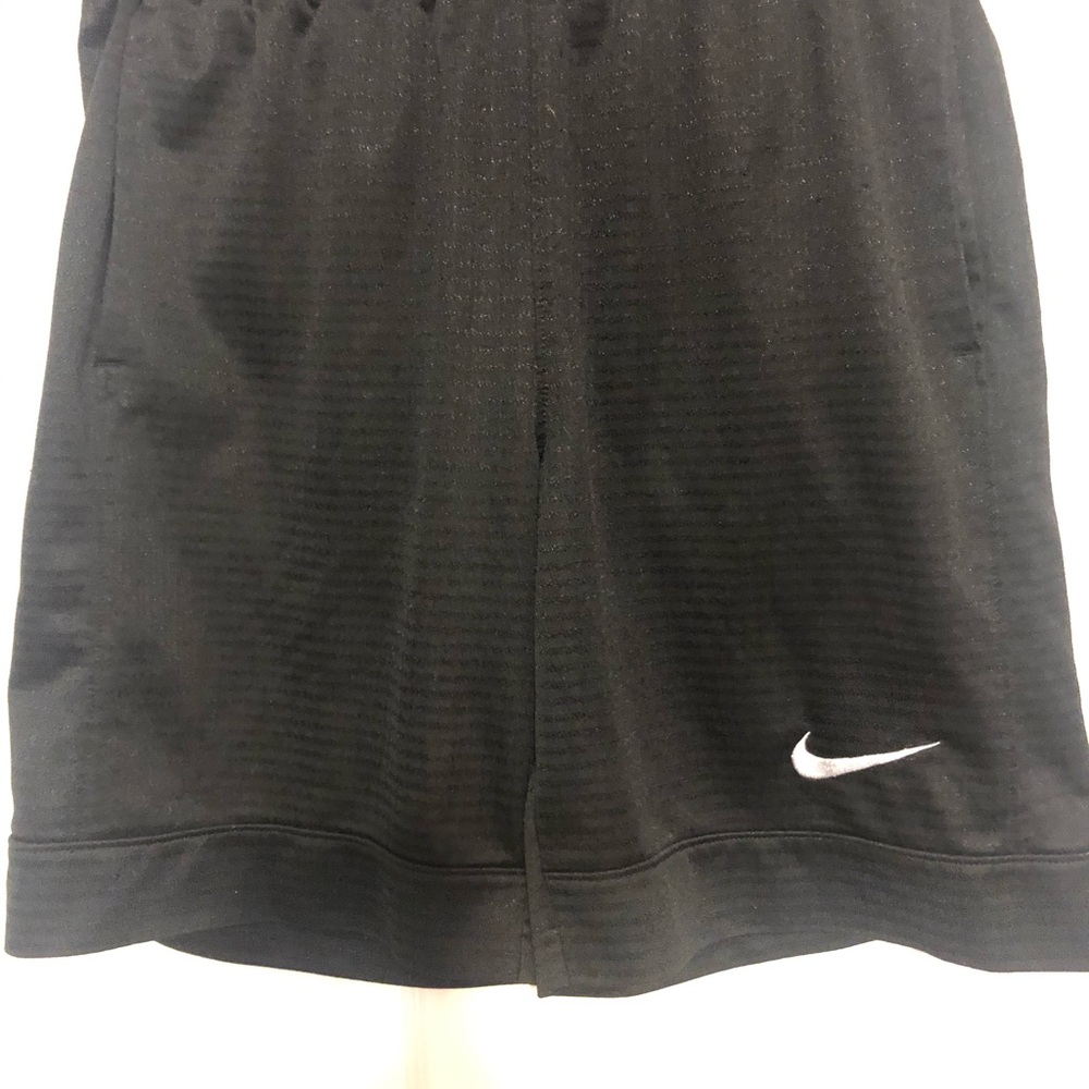 Youth boys black Nike shorts w/ green drawstring